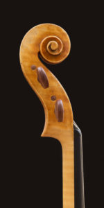 Side view of viola scroll, A Guarneri model by William Castle